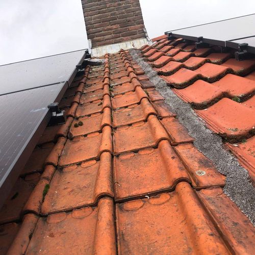 Hellend dak Hoogland met oude dakpannen